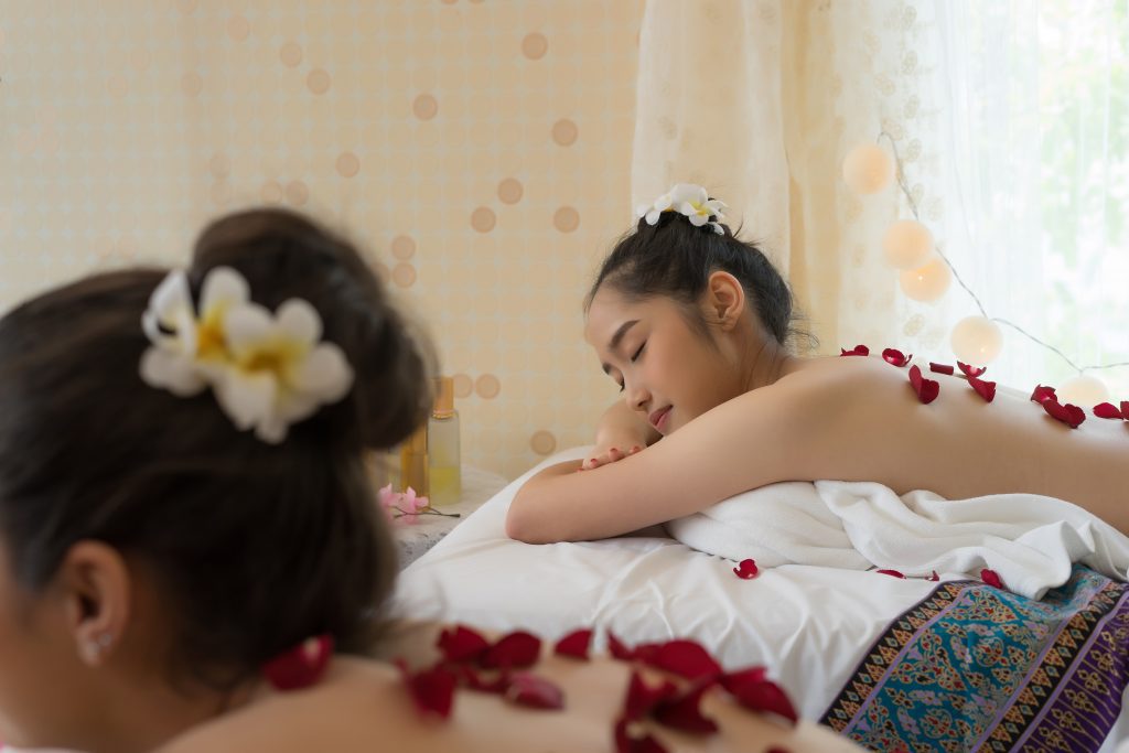 Young beautiful woman relaxing during spa treatment. Massage and Spa in Phuket: A Comprehensive Guide